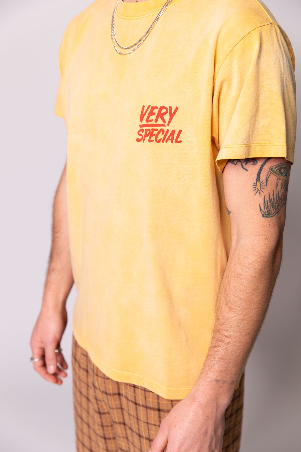 Yellow Chest Logo Faded Tee